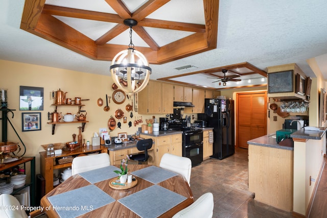 dining space with coffered ceiling, ceiling fan with notable chandelier, a textured ceiling, and a tray ceiling