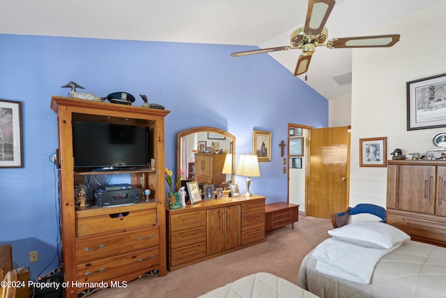 bedroom with high vaulted ceiling, light colored carpet, and ceiling fan