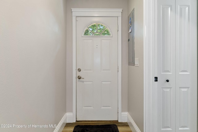 doorway to outside featuring hardwood / wood-style flooring