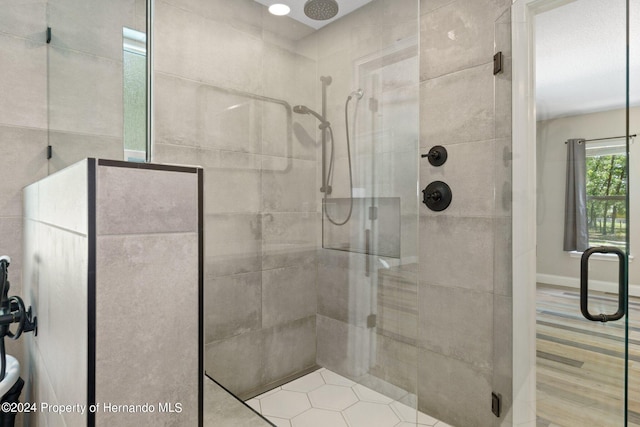 bathroom with an enclosed shower