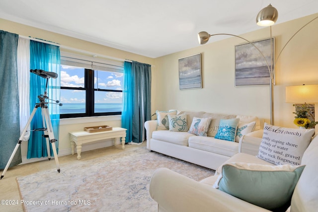 living room featuring a water view