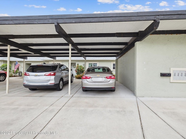 view of car parking with a carport