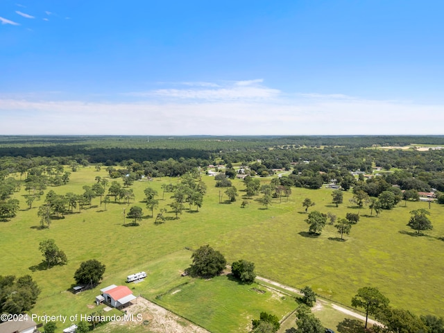 birds eye view of property featuring a rural view