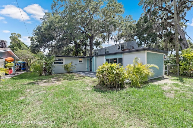 5369 Tuscawilla Dr, Weeki Wachee, FL 34607 - rear view of house