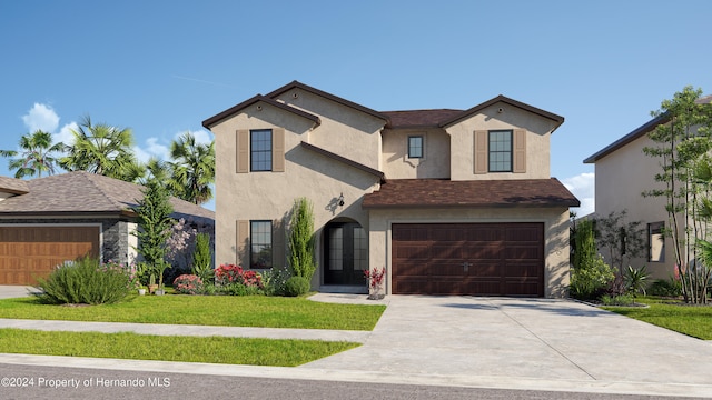 view of front facade featuring a garage and a front yard