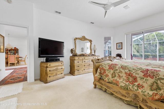 21312 Preservation Dr, Land O Lakes, FL 34638 - bedroom featuring carpet flooring, access to exterior, ceiling fan, and visible vents
