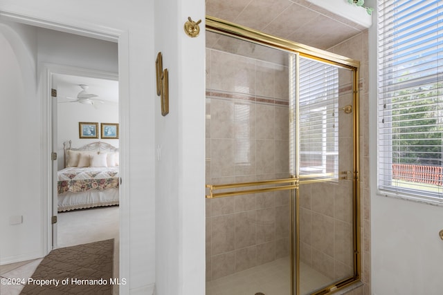 21312 Preservation Dr, Land O Lakes, FL 34638 - ensuite bathroom with connected bathroom, a ceiling fan, and a shower stall