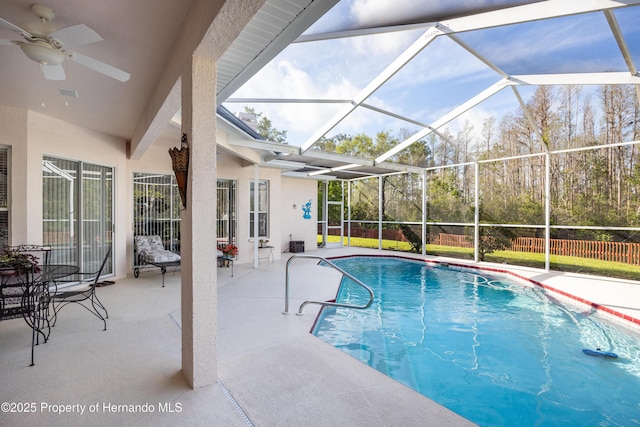 21312 Preservation Dr, Land O Lakes, FL 34638 - view of pool featuring a fenced in pool, glass enclosure, ceiling fan, and a patio area