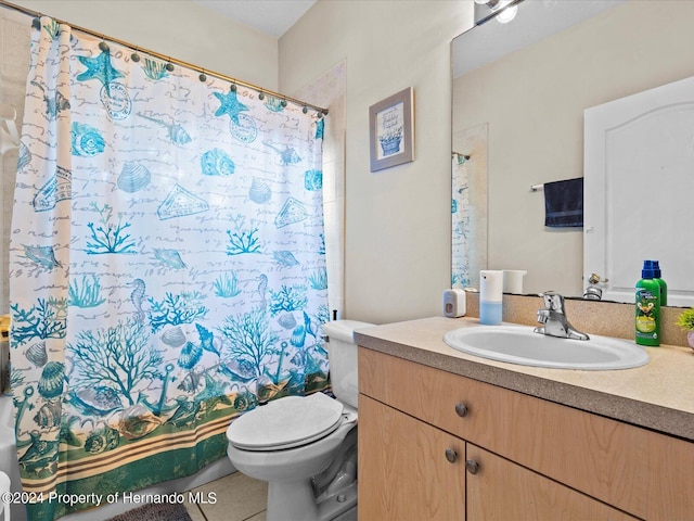 full bathroom with tile patterned floors, vanity, shower / bath combination with curtain, and toilet