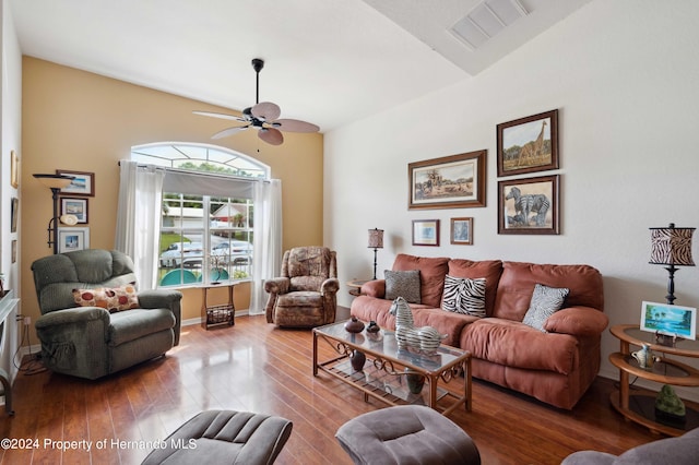 living room with ceiling fan and wood-type flooring