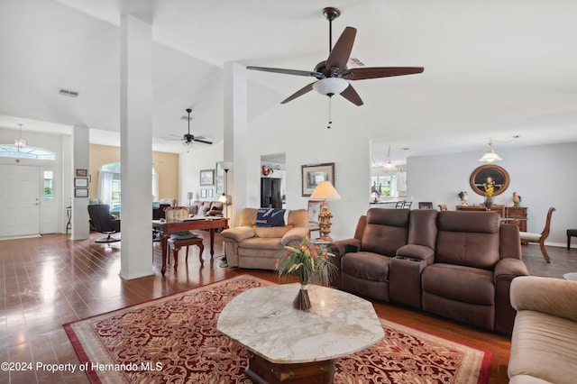 living room featuring high vaulted ceiling, a wealth of natural light, dark wood-type flooring, and ceiling fan