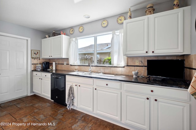 kitchen featuring decorative backsplash, sink, black dishwasher, and white cabinets