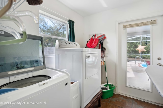 laundry room with washer and clothes dryer