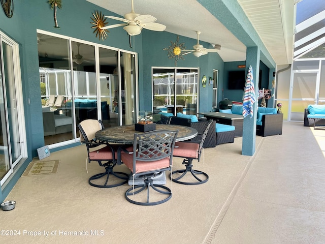 view of patio with ceiling fan and an outdoor hangout area