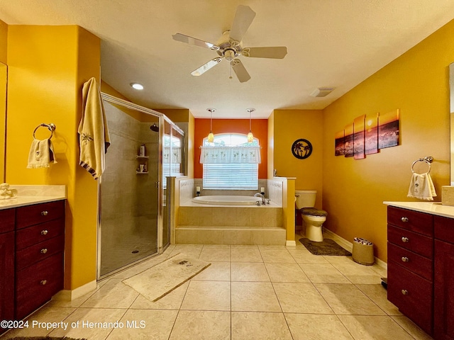 full bathroom with vanity, tile patterned floors, toilet, and ceiling fan