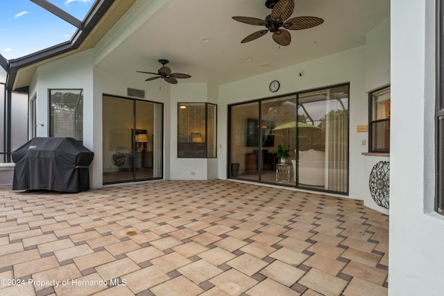 view of patio featuring ceiling fan and grilling area