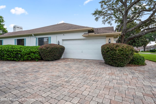 view of home's exterior featuring a garage