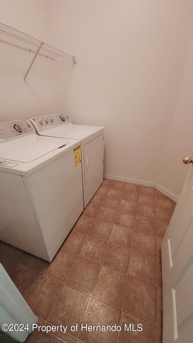 laundry room with washer and dryer