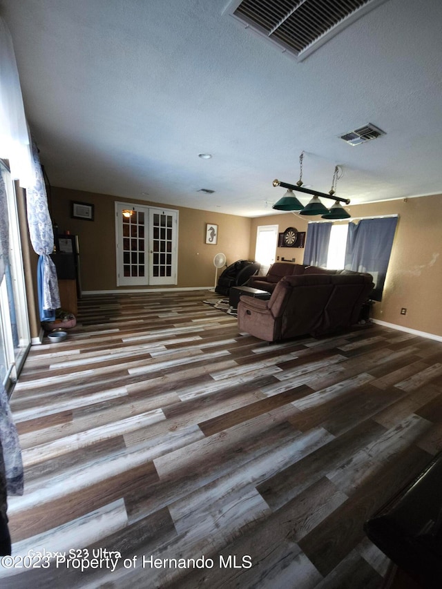 living room with wood-type flooring