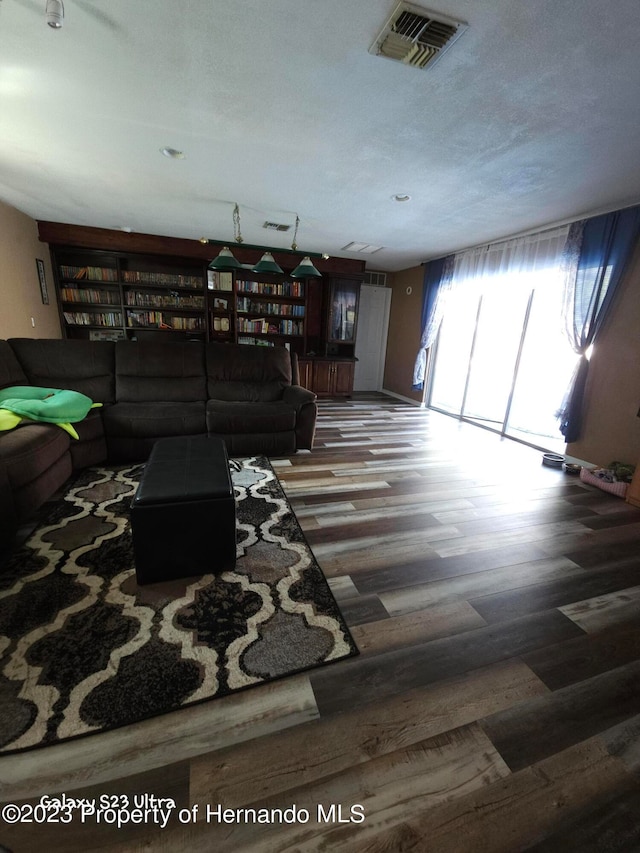 living room with hardwood / wood-style flooring