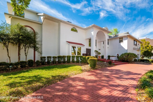 view of front of house with a front yard