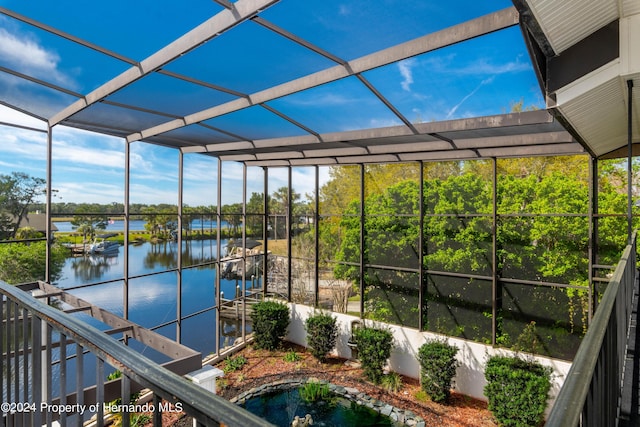 11915 W Riverhaven Dr, Homosassa, FL 34448 - sunroom / solarium featuring a water view and view of scattered trees