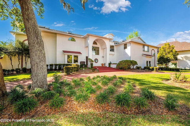 11915 W Riverhaven Dr, Homosassa, FL 34448 - mediterranean / spanish home with stucco siding