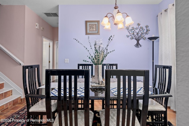 dining room featuring a notable chandelier