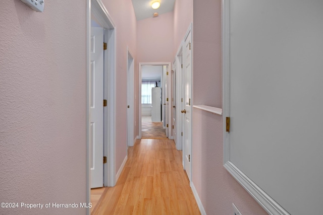 hallway featuring light hardwood / wood-style flooring