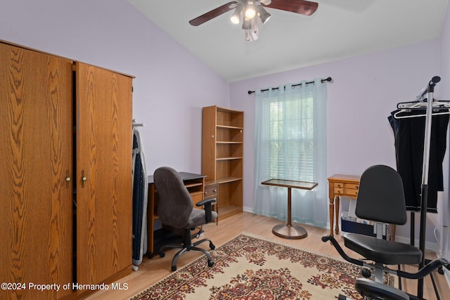 office area with ceiling fan, light wood-type flooring, and lofted ceiling