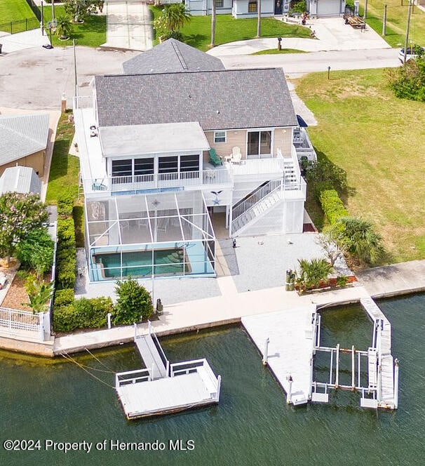 bird's eye view with a water view