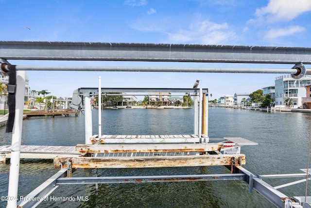 view of dock with a water view