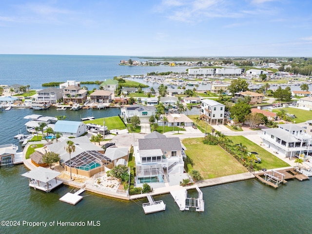 bird's eye view with a water view