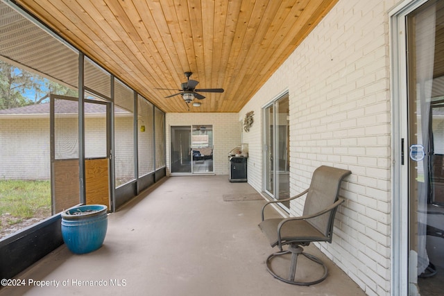 view of patio featuring ceiling fan