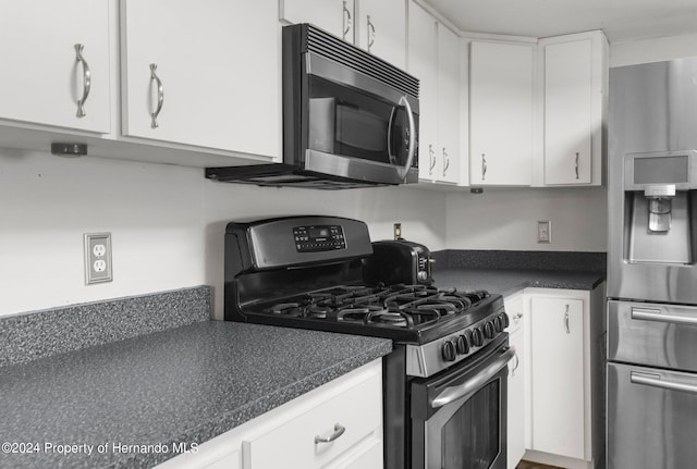 kitchen with white cabinets and stainless steel appliances