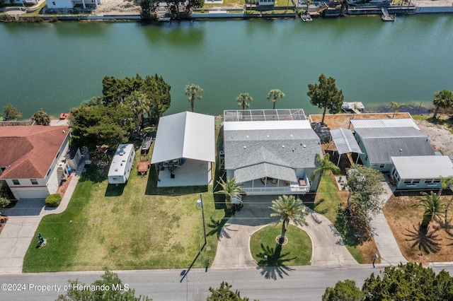 drone / aerial view with a water view