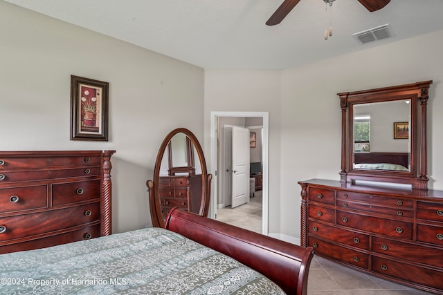 bedroom with light tile patterned floors and ceiling fan