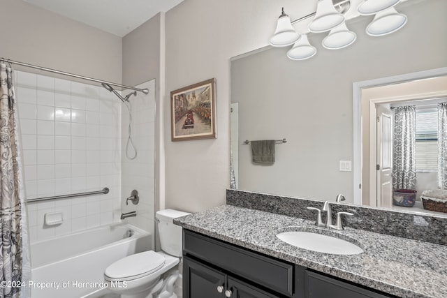 full bathroom featuring shower / bath combo with shower curtain, vanity, and toilet