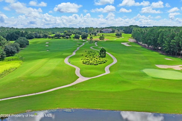 surrounding community featuring a water view