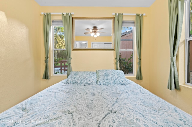 bedroom featuring ceiling fan