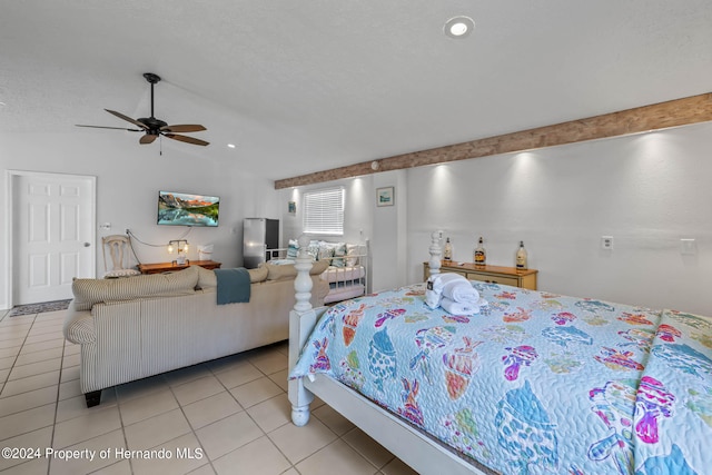 tiled bedroom featuring lofted ceiling and ceiling fan