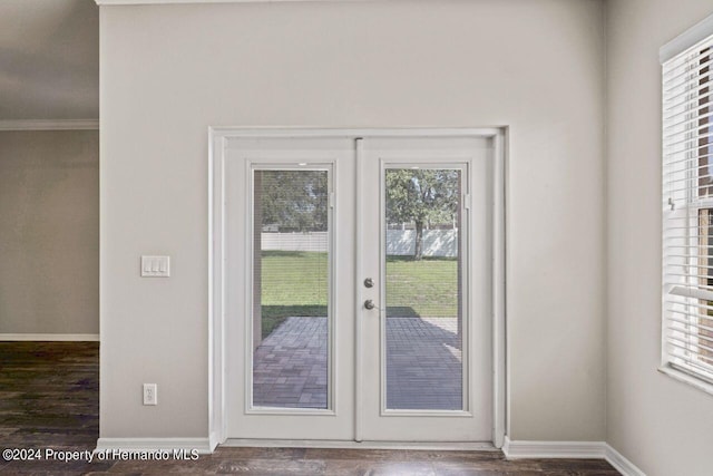 doorway to outside featuring dark hardwood / wood-style flooring and french doors