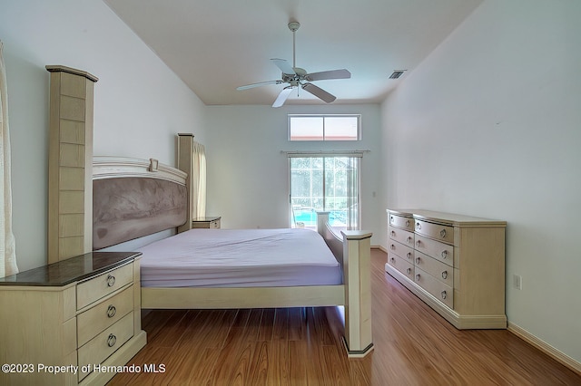 bedroom featuring light wood-type flooring and ceiling fan