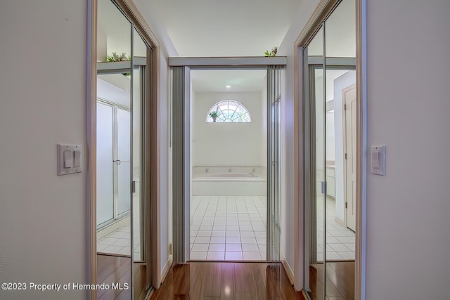 hall featuring hardwood / wood-style flooring