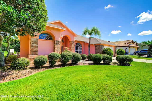 view of front of home with a front yard