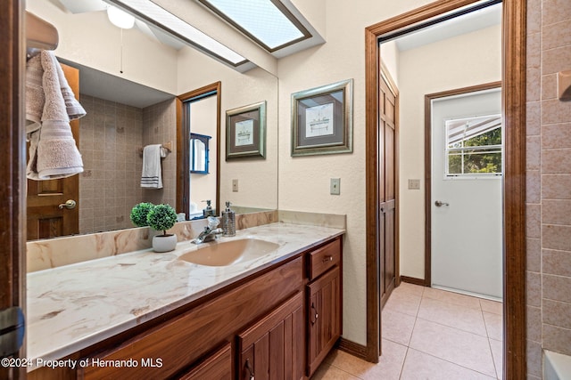 bathroom featuring vanity and tile patterned flooring