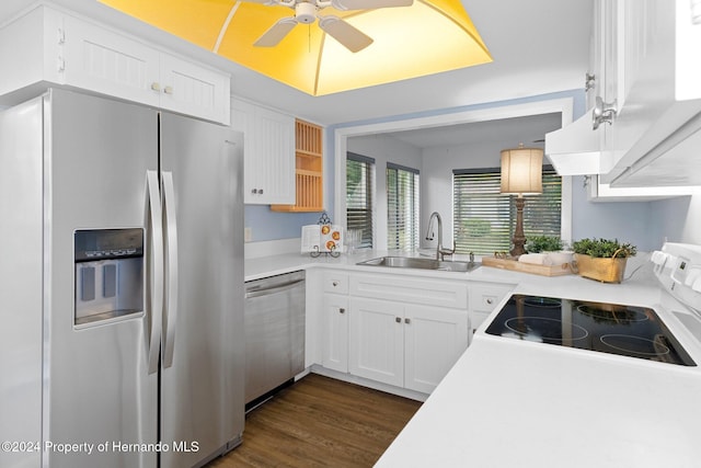 kitchen featuring ceiling fan, sink, white cabinetry, dark wood-type flooring, and appliances with stainless steel finishes