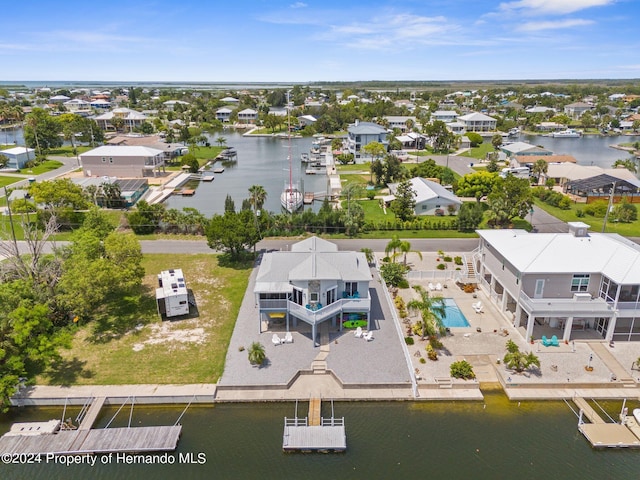 drone / aerial view featuring a water view