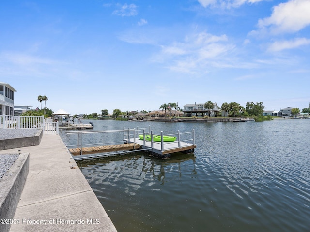 view of dock with a water view