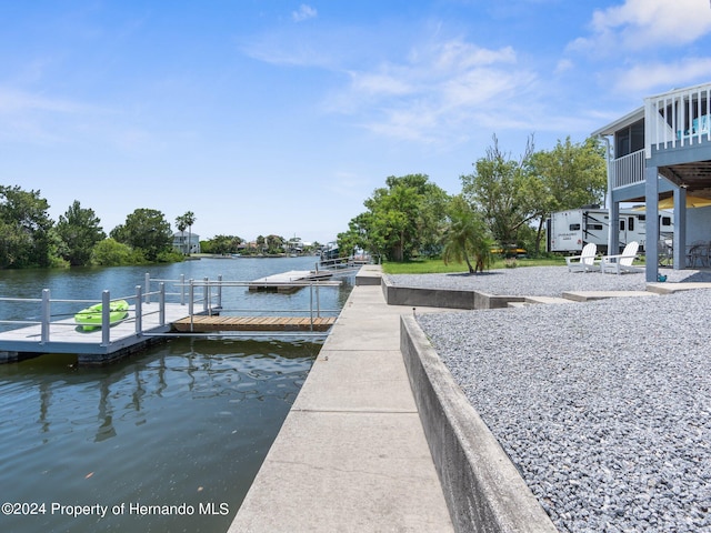 view of dock with a water view